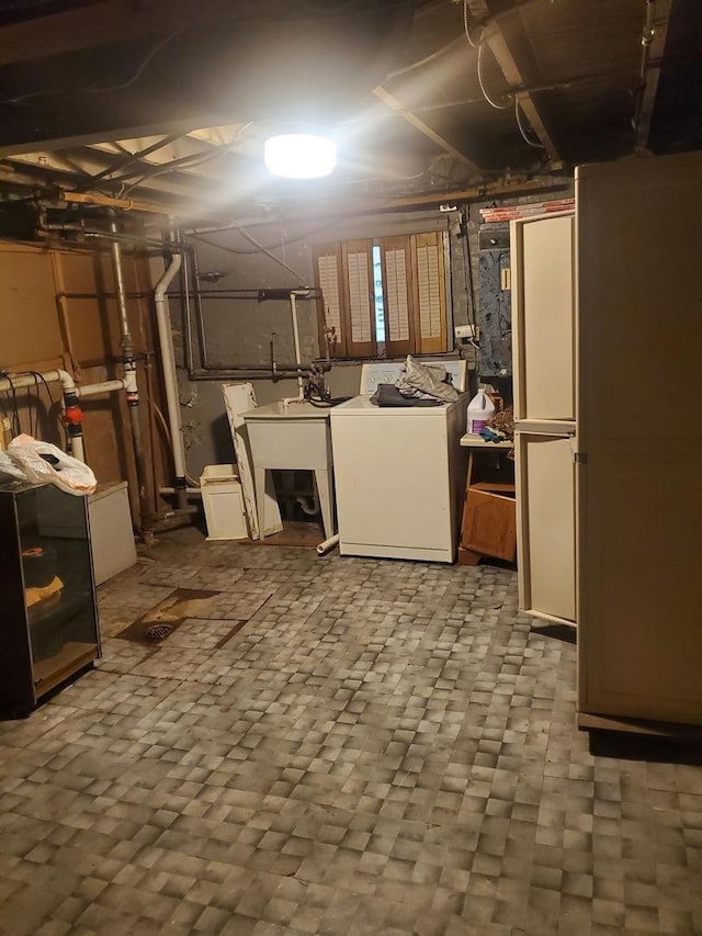 basement featuring washing machine and dryer