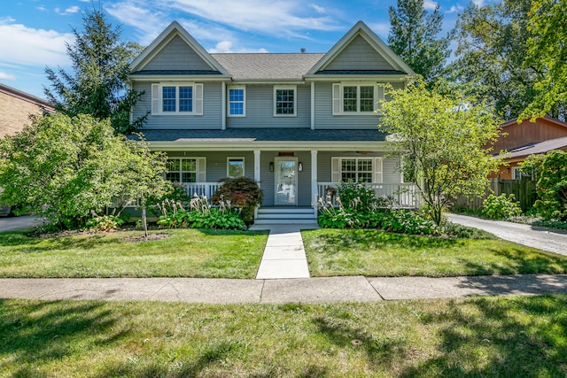 view of front facade featuring a porch and a front yard