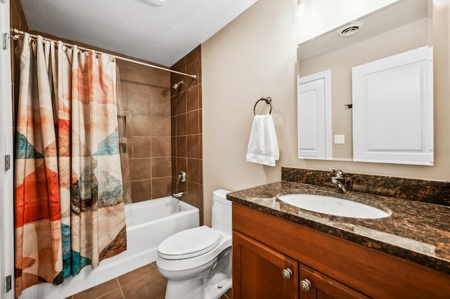 full bathroom with vanity, shower / bath combo with shower curtain, toilet, and tile patterned floors