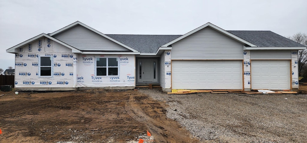 view of front of property with a garage