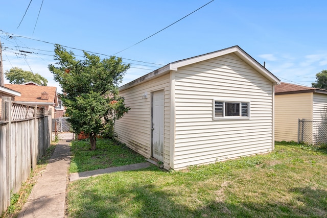 view of outdoor structure with a yard