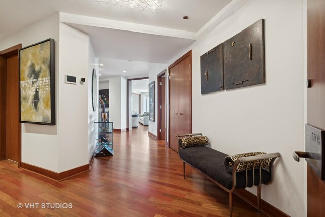 corridor featuring hardwood / wood-style floors