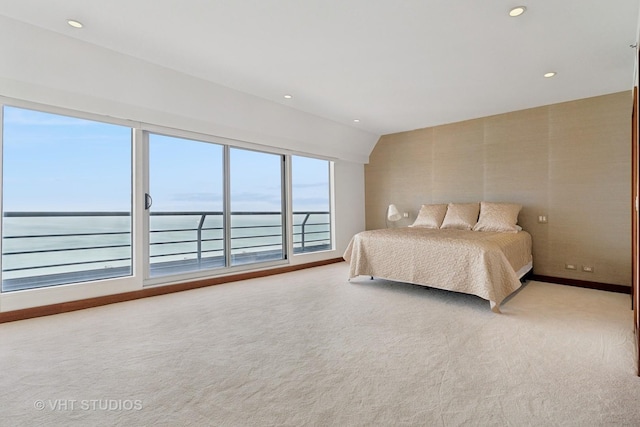 bedroom featuring access to exterior, recessed lighting, baseboards, and light colored carpet