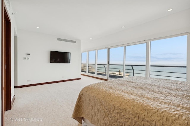 bedroom featuring carpet floors, recessed lighting, visible vents, and baseboards