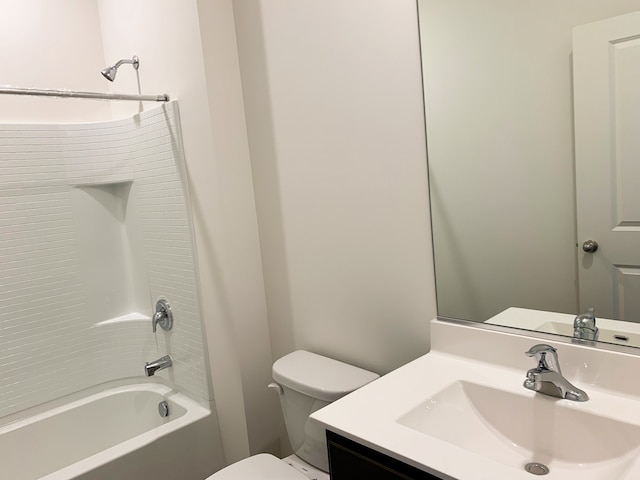 full bathroom featuring shower / bath combination, toilet, and vanity