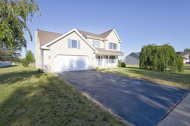 view of front facade featuring aphalt driveway, an attached garage, a front lawn, and a chimney