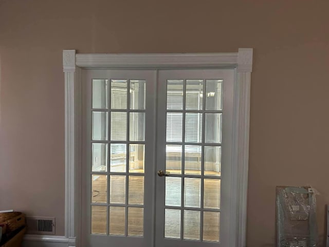 entryway featuring french doors