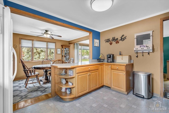 kitchen with baseboards, ornamental molding, freestanding refrigerator, light countertops, and open shelves