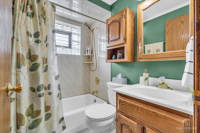 full bath featuring toilet, shower / tub combo with curtain, and vanity