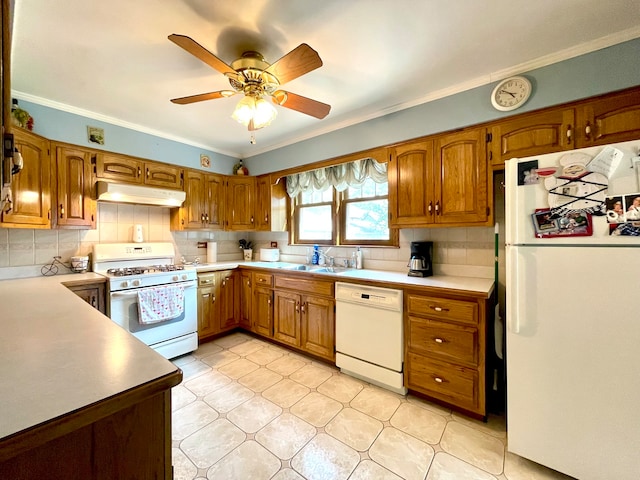 kitchen featuring ceiling fan, white appliances, and tasteful backsplash