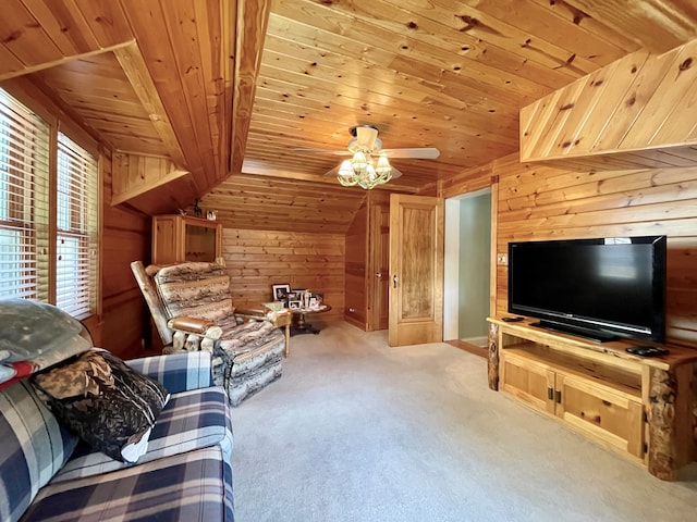 carpeted living room with wooden walls, wood ceiling, and ceiling fan