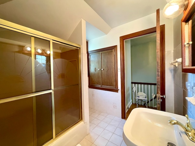 bathroom featuring tile patterned flooring, tile walls, sink, and shower with separate bathtub