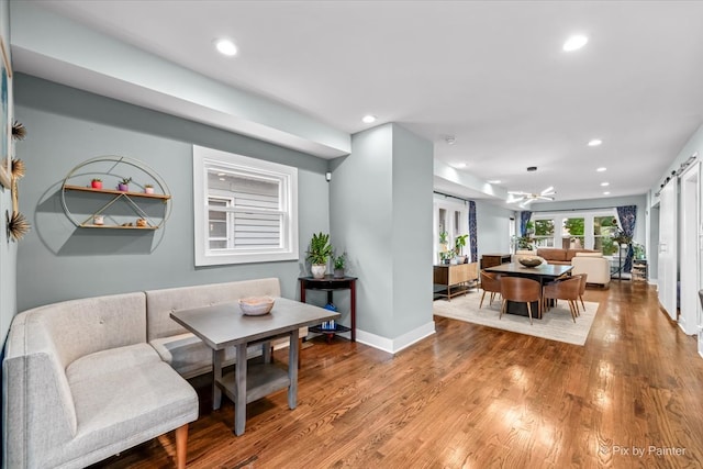 dining space featuring hardwood / wood-style floors