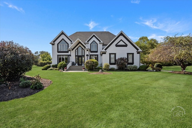 view of front facade with a front lawn