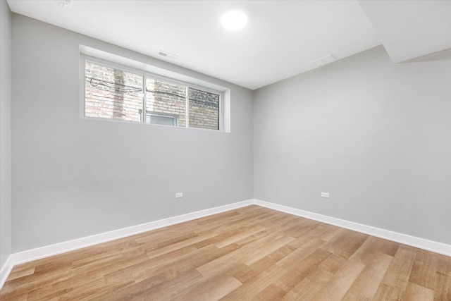 unfurnished room featuring light wood-type flooring