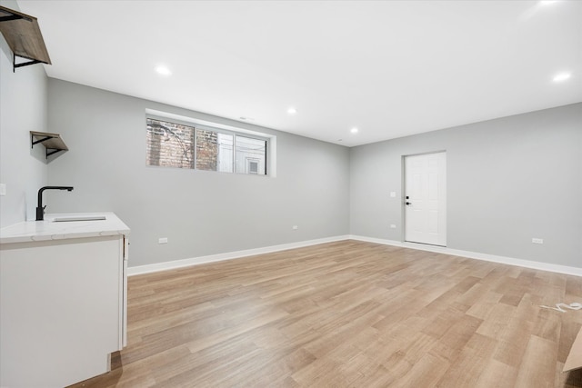 interior space featuring light hardwood / wood-style floors and sink