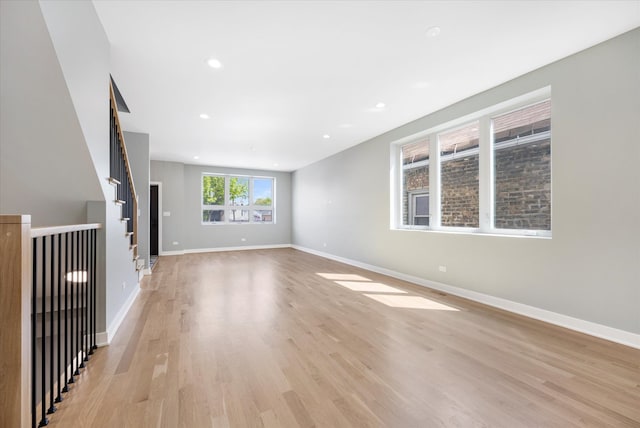 unfurnished room featuring light hardwood / wood-style flooring