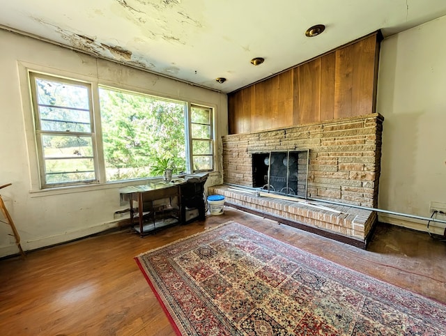 living room featuring hardwood / wood-style floors and a wealth of natural light