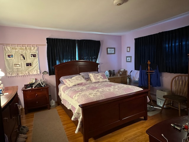 bedroom featuring light hardwood / wood-style floors