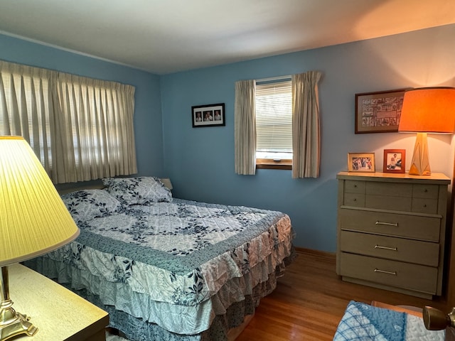 bedroom featuring hardwood / wood-style floors