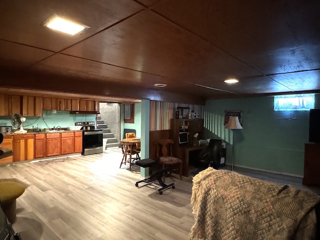 interior space featuring sink and light hardwood / wood-style floors