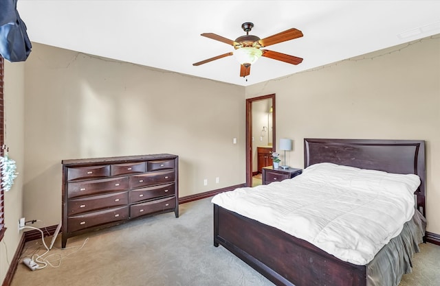 bedroom with light colored carpet and ceiling fan