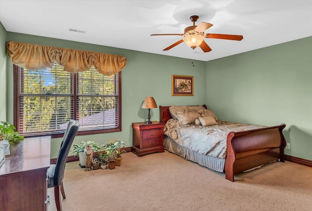 4703 W Kirby Ave, Champaign, IL 61822 - bedroom with carpet floors and ceiling fan