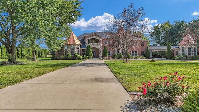 tudor-style house with a front lawn