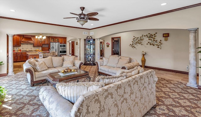 4703 W Kirby Ave, Champaign, IL 61822 - living room featuring ornate columns, arched walkways, ceiling fan, recessed lighting, and a chandelier
