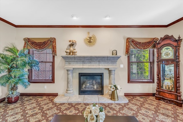 living room with crown molding and a fireplace