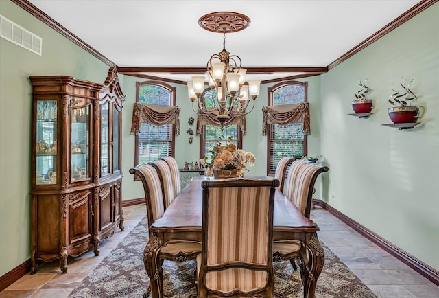 dining area with ornamental molding and a chandelier