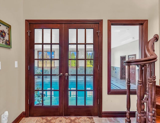 4703 W Kirby Ave, Champaign, IL 61822 - entryway with french doors and healthy amount of natural light