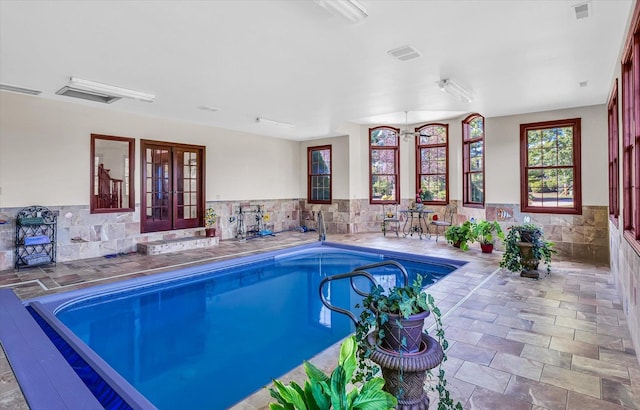 4703 W Kirby Ave, Champaign, IL 61822 - indoor pool with french doors