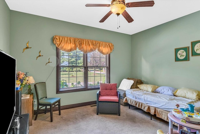 4703 W Kirby Ave, Champaign, IL 61822 - bedroom with light colored carpet and a ceiling fan