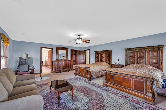 carpeted bedroom featuring ceiling fan