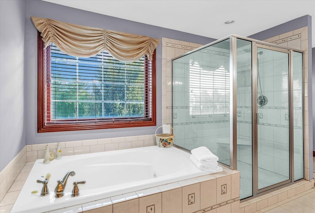 4703 W Kirby Ave, Champaign, IL 61822 - full bathroom featuring a garden tub and a shower stall