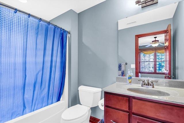 full bathroom with shower / bathtub combination with curtain, toilet, and vanity