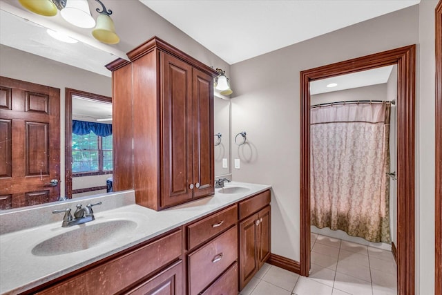 4703 W Kirby Ave, Champaign, IL 61822 - bathroom featuring double vanity, tile patterned floors, and a shower with shower curtain