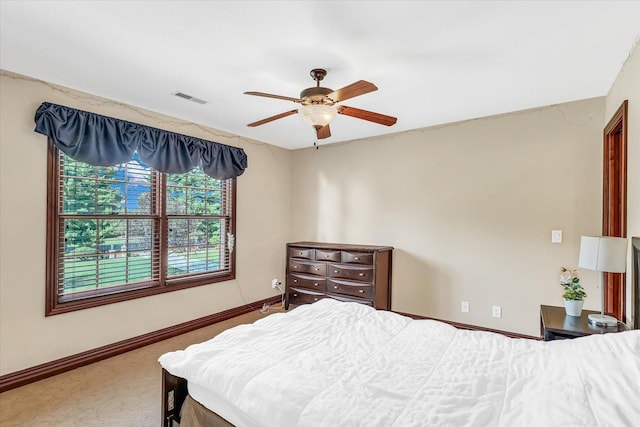 4703 W Kirby Ave, Champaign, IL 61822 - bedroom with carpet and ceiling fan