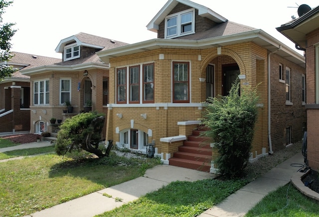 view of front of house with a front lawn