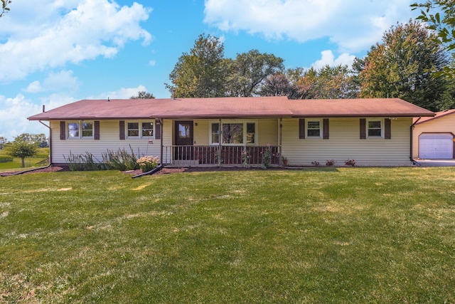 ranch-style home featuring a front lawn, covered porch, and a garage