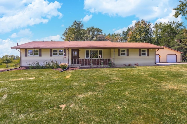 ranch-style home featuring a garage, covered porch, an outdoor structure, and a front yard