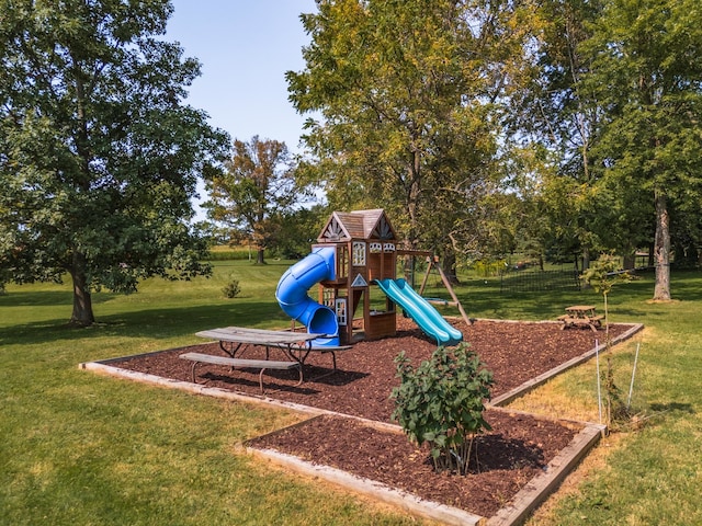 community playground featuring a yard