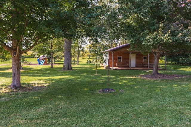 view of yard with a playground