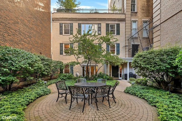 view of patio / terrace with a balcony