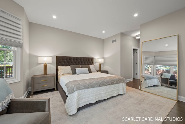 bedroom featuring light hardwood / wood-style floors