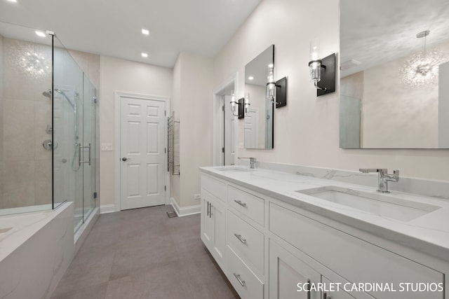 bathroom featuring vanity and a shower with shower door