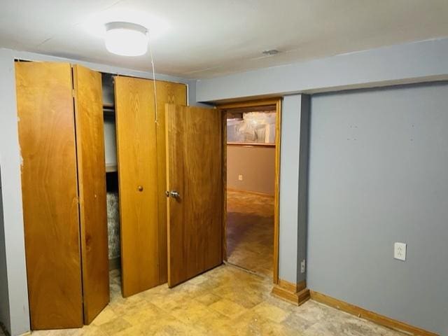 unfurnished bedroom featuring a closet