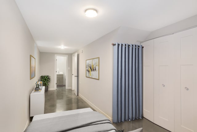 bedroom featuring a closet and radiator heating unit