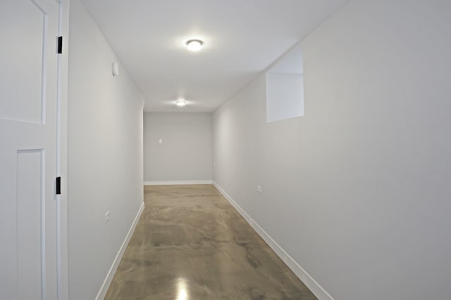 corridor with concrete floors